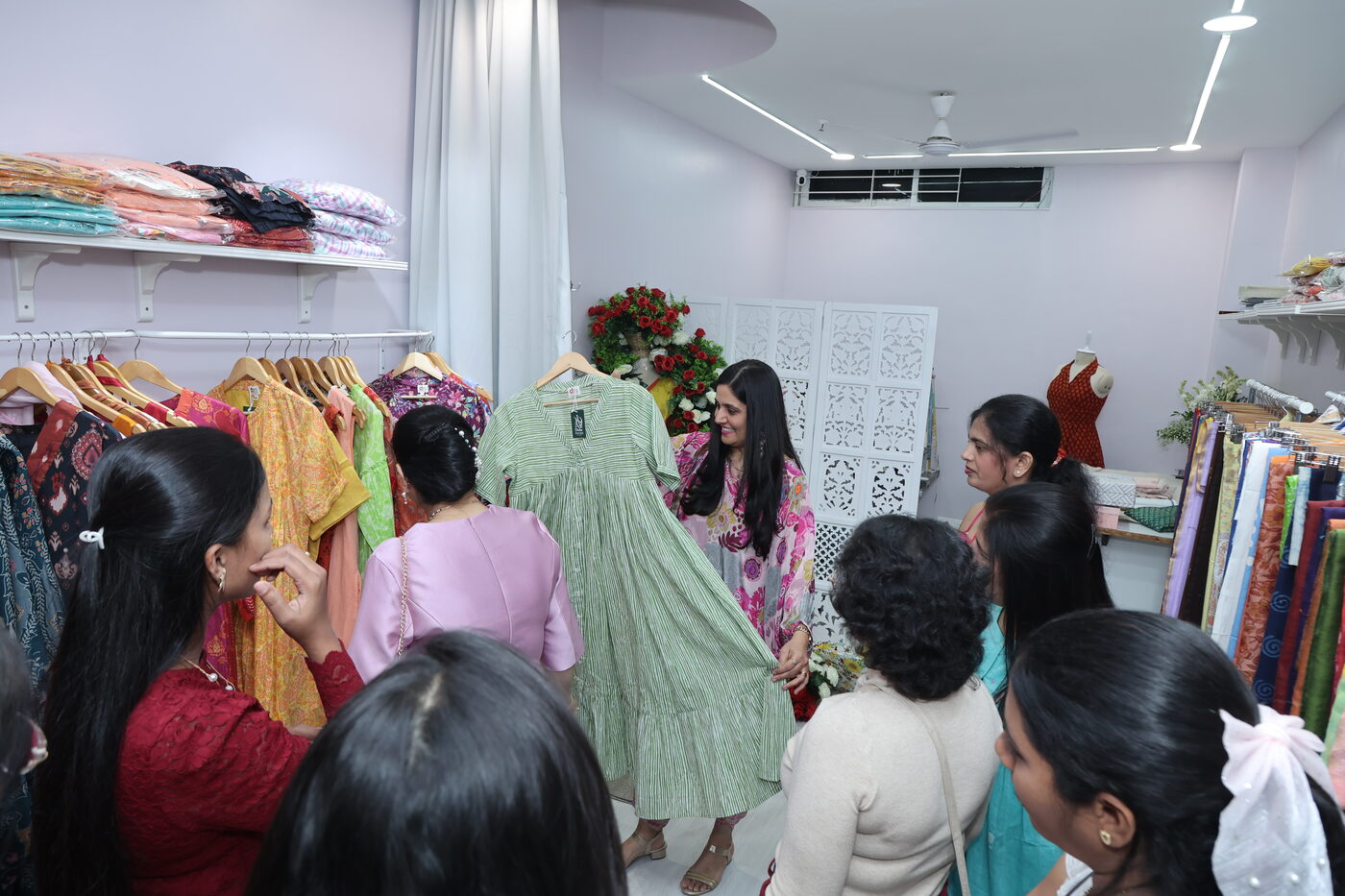 Disha with customers at Disha Fashion Studio Pune — women's boutique